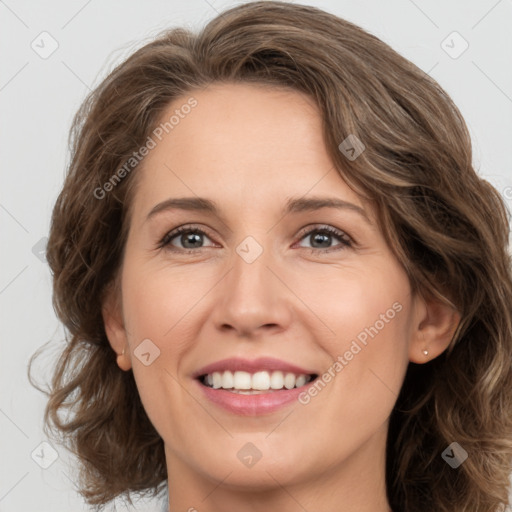 Joyful white young-adult female with medium  brown hair and green eyes