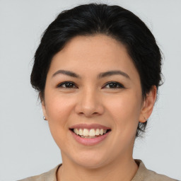 Joyful asian young-adult female with short  brown hair and brown eyes