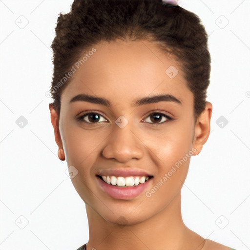 Joyful latino young-adult female with short  black hair and brown eyes