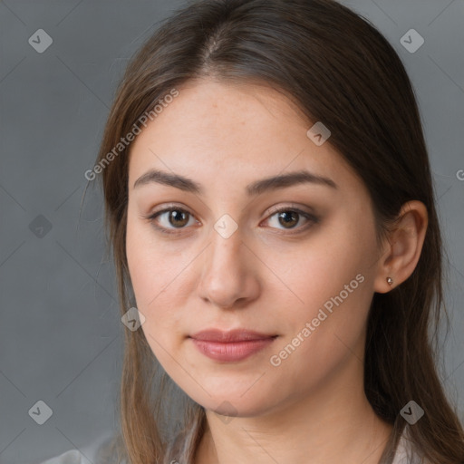 Neutral white young-adult female with long  brown hair and brown eyes