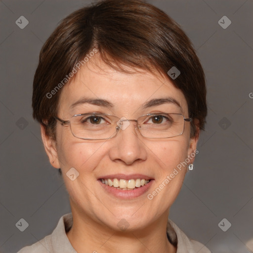 Joyful white adult female with short  brown hair and brown eyes