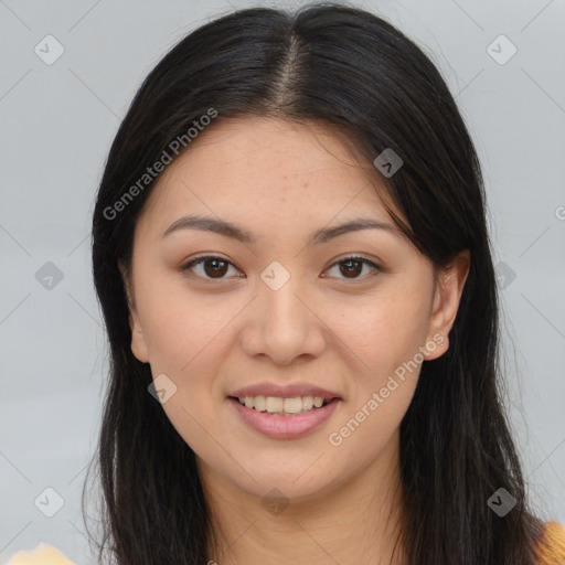 Joyful asian young-adult female with long  brown hair and brown eyes