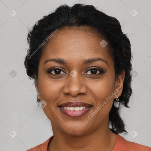 Joyful black young-adult female with medium  brown hair and brown eyes