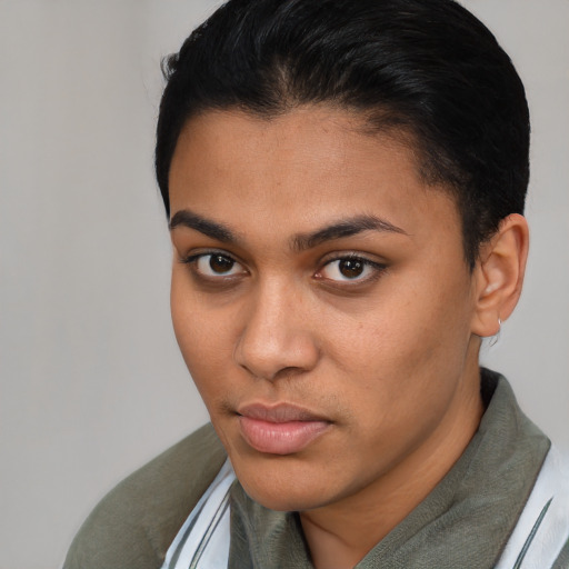 Neutral latino young-adult female with short  brown hair and brown eyes