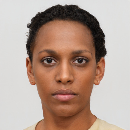 Neutral black young-adult female with short  brown hair and brown eyes