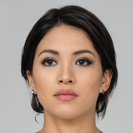 Neutral asian young-adult female with medium  black hair and brown eyes