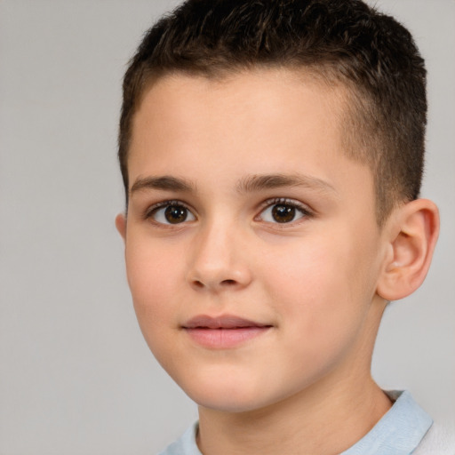 Joyful white child male with short  brown hair and brown eyes