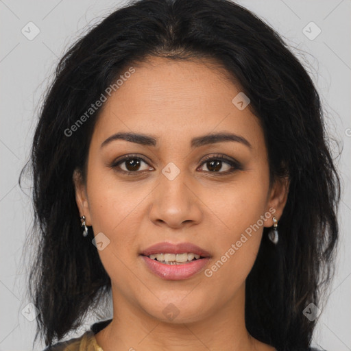 Joyful latino young-adult female with long  brown hair and brown eyes