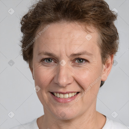 Joyful white adult female with short  brown hair and brown eyes