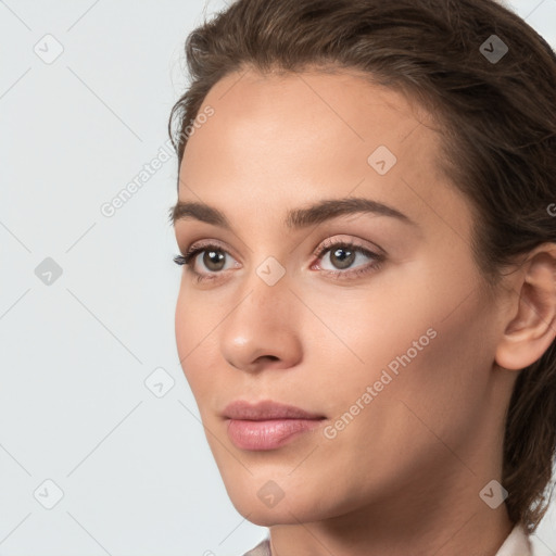 Neutral white young-adult female with medium  brown hair and brown eyes