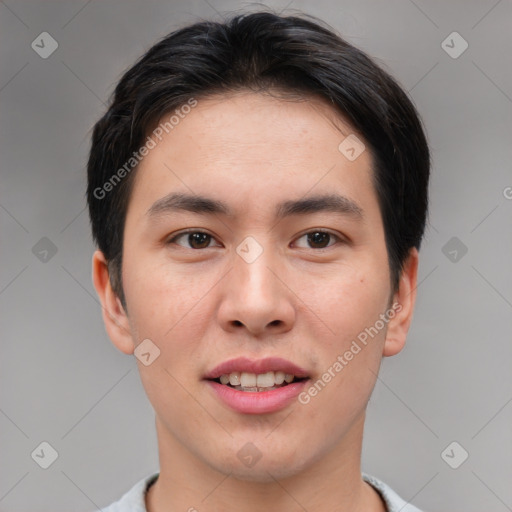 Joyful asian young-adult male with short  brown hair and brown eyes