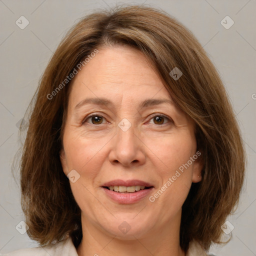 Joyful white adult female with medium  brown hair and brown eyes