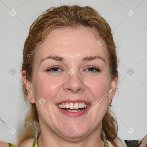 Joyful white adult female with medium  brown hair and blue eyes