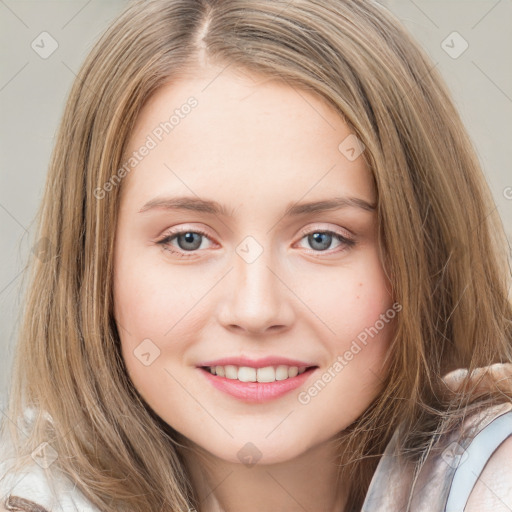 Joyful white young-adult female with long  brown hair and blue eyes