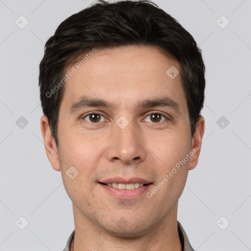 Joyful white adult male with short  brown hair and brown eyes