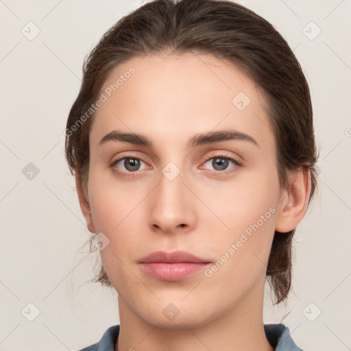 Neutral white young-adult female with medium  brown hair and brown eyes