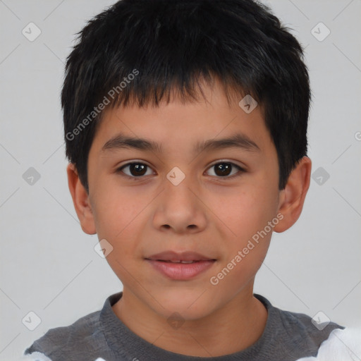 Joyful asian child male with short  brown hair and brown eyes