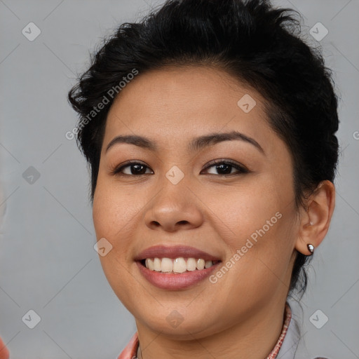 Joyful latino young-adult female with short  brown hair and brown eyes