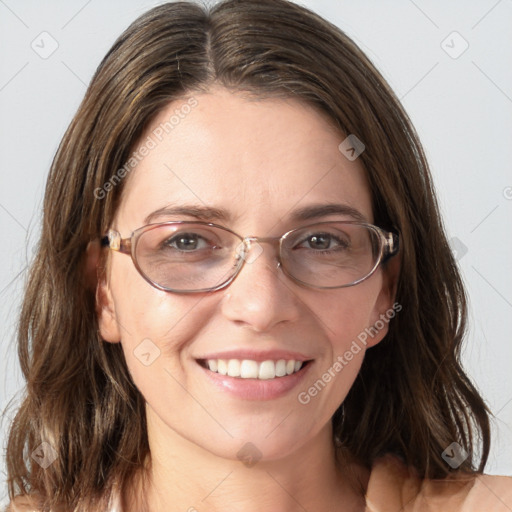 Joyful white young-adult female with medium  brown hair and blue eyes