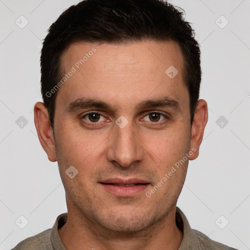 Joyful white young-adult male with short  brown hair and brown eyes