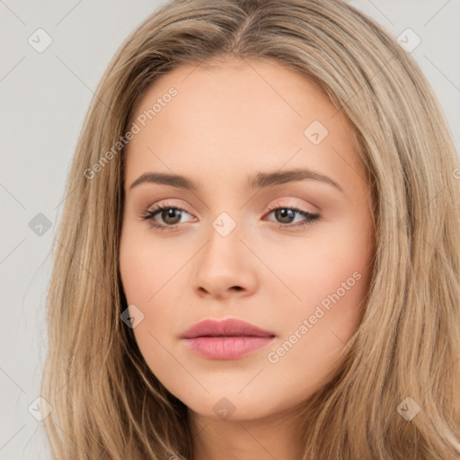 Neutral white young-adult female with long  brown hair and brown eyes