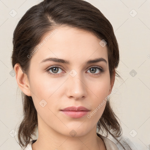 Neutral white young-adult female with medium  brown hair and brown eyes