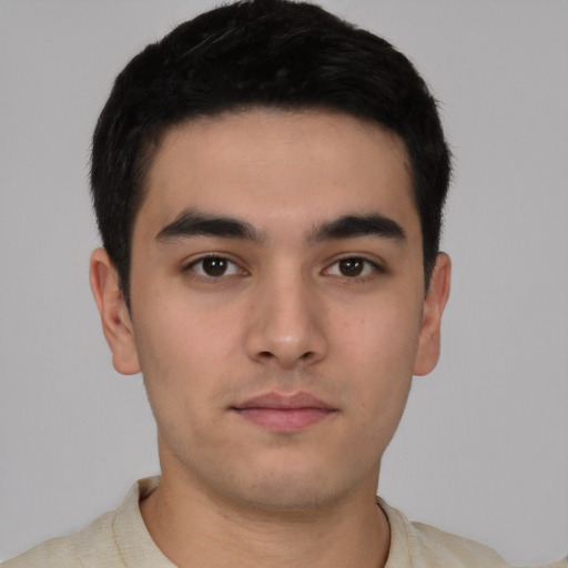 Neutral white young-adult male with short  black hair and brown eyes