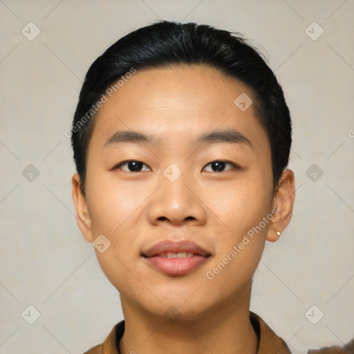 Joyful asian young-adult male with short  black hair and brown eyes