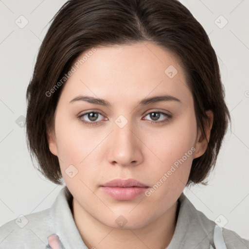 Neutral white young-adult female with medium  brown hair and brown eyes