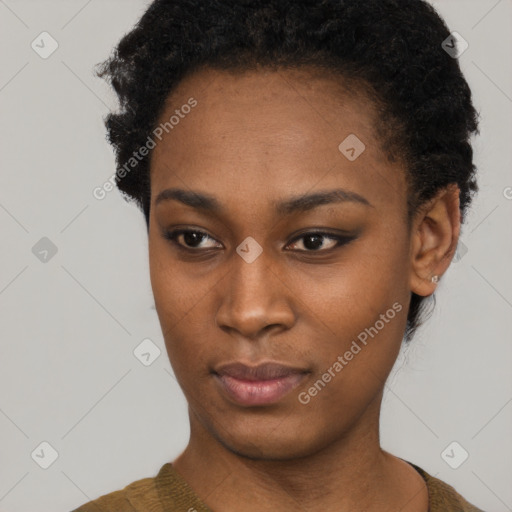 Neutral black young-adult female with short  black hair and brown eyes