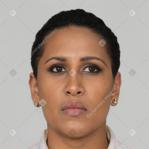 Neutral latino young-adult female with short  brown hair and brown eyes