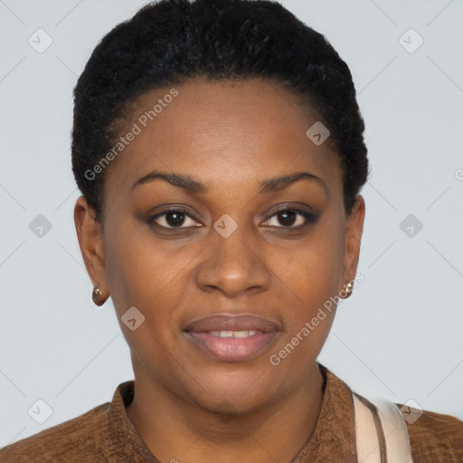 Joyful black young-adult female with short  brown hair and brown eyes