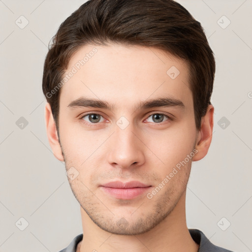 Neutral white young-adult male with short  brown hair and grey eyes