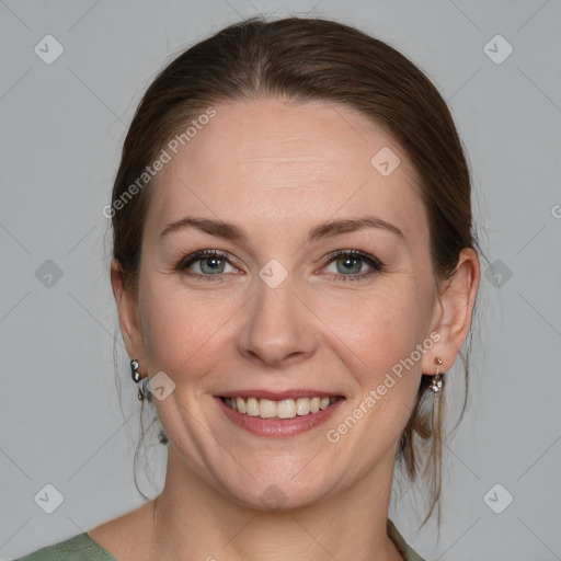 Joyful white young-adult female with medium  brown hair and blue eyes