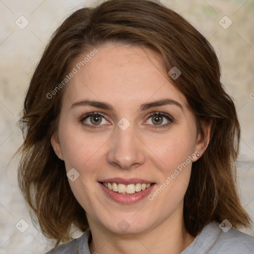 Joyful white young-adult female with medium  brown hair and green eyes