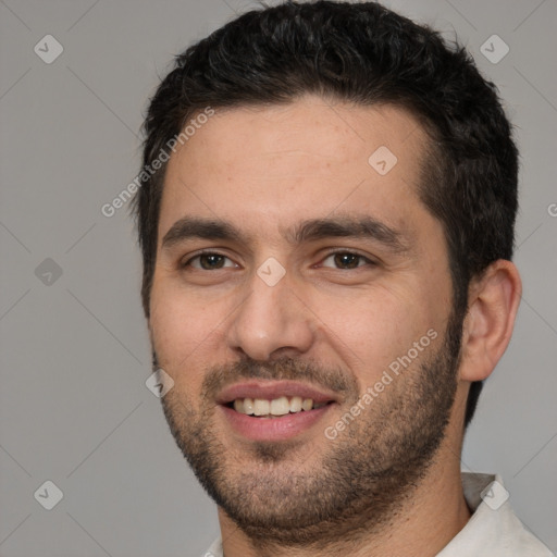 Joyful white young-adult male with short  black hair and brown eyes