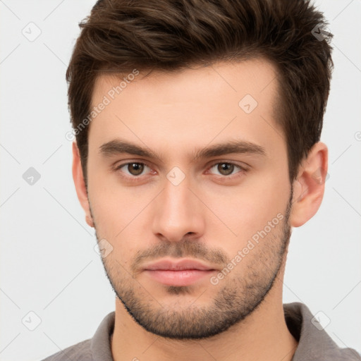 Neutral white young-adult male with short  brown hair and brown eyes