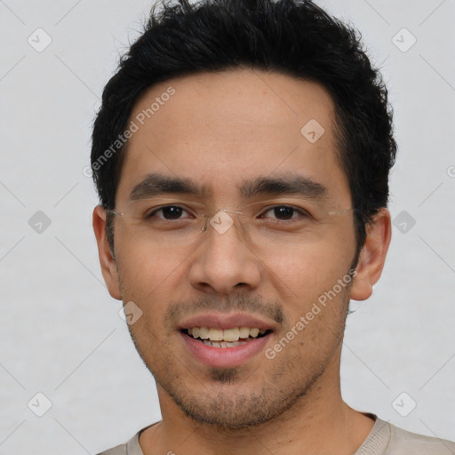 Joyful white young-adult male with short  black hair and brown eyes