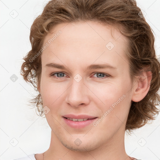 Joyful white young-adult female with medium  brown hair and blue eyes