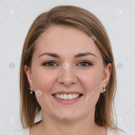 Joyful white young-adult female with medium  brown hair and grey eyes