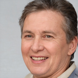 Joyful white middle-aged male with short  brown hair and brown eyes