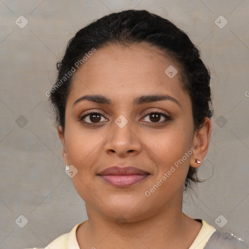 Joyful latino young-adult female with short  brown hair and brown eyes