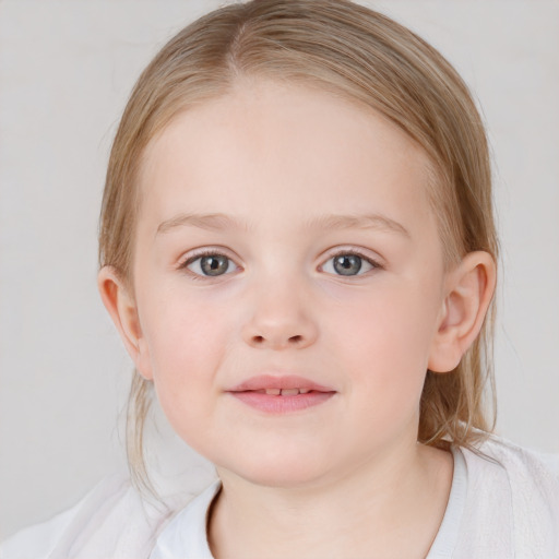 Joyful white child female with medium  brown hair and blue eyes