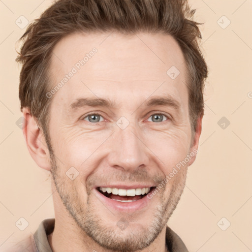 Joyful white adult male with short  brown hair and grey eyes