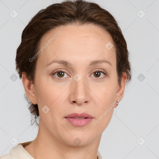 Joyful white adult female with short  brown hair and brown eyes