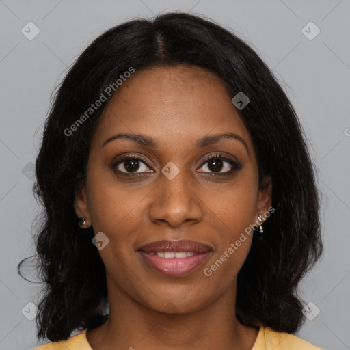 Joyful black young-adult female with medium  brown hair and brown eyes