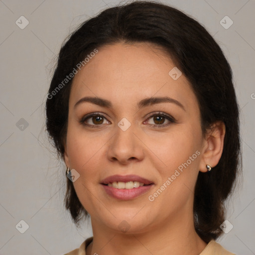 Joyful white adult female with medium  brown hair and brown eyes