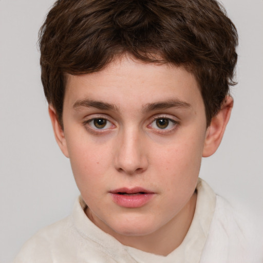 Neutral white child male with short  brown hair and green eyes