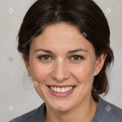 Joyful white adult female with medium  brown hair and grey eyes