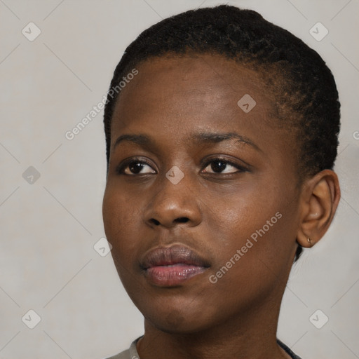 Neutral black young-adult female with short  brown hair and brown eyes